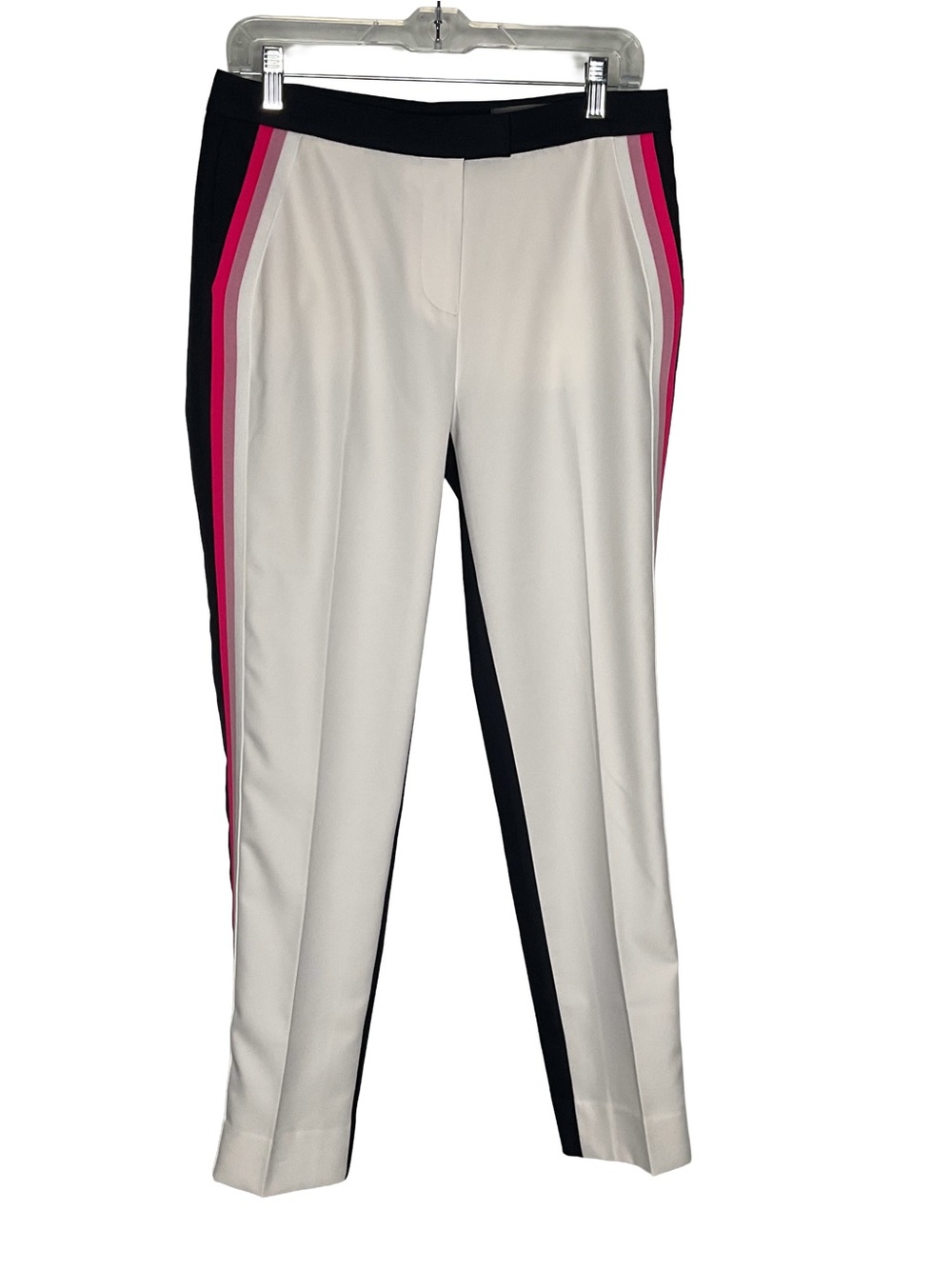 G/FORE White front and navy blue‎ back golf trousers. Luxury golf brand.